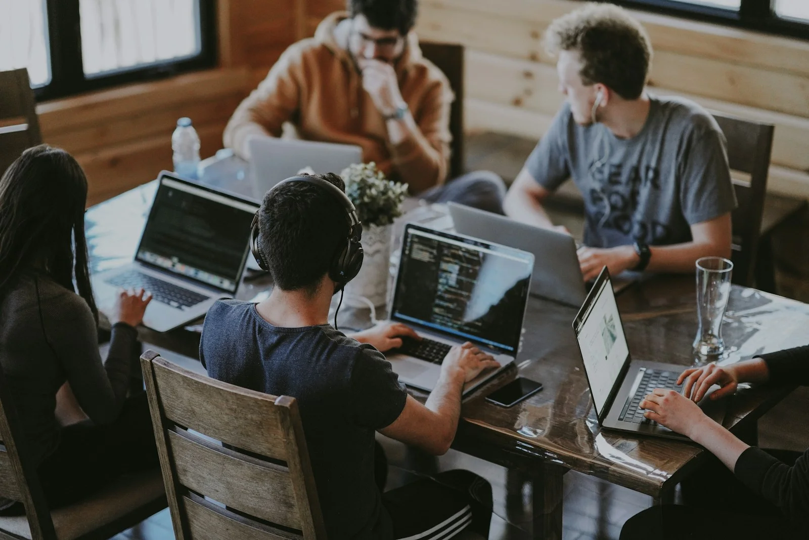 A small team working together on laptops
